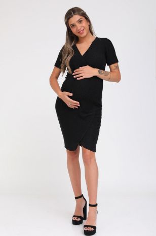 אישה לובשת שמלת הריון אמבר לורקס שחור של אבישג ארבל