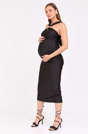 אישה לובשת שמלת הריון קנדיס של אבישג ארבל	